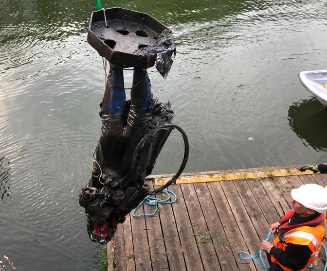 Photograph taken with permission from the Twitter feed of Bristol City Council showing the statue of slave trader Edward Colston being removed from the harbour where it was dumped by anti-racism protesters on Sunday. Photo: Bristol City Council/PA Media/dpa