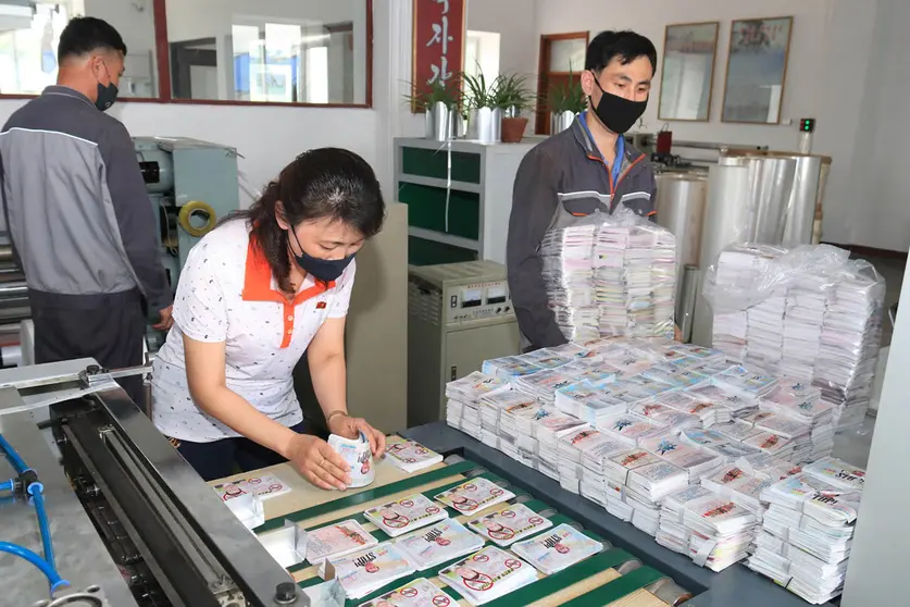 HANDOUT - North Koreans prepare anti-South Korea propaganda leaflets on Saturday, in a photo handout from the North Korean news agency KCNA. North Korea is preparing to send around 12 million propaganda leaflets to South Korea using 3,000 balloons, state media reported on Monday. Photo: -/kcna/dpa - ATTENTION: editorial use only and only if the credit mentioned above is referenced in full