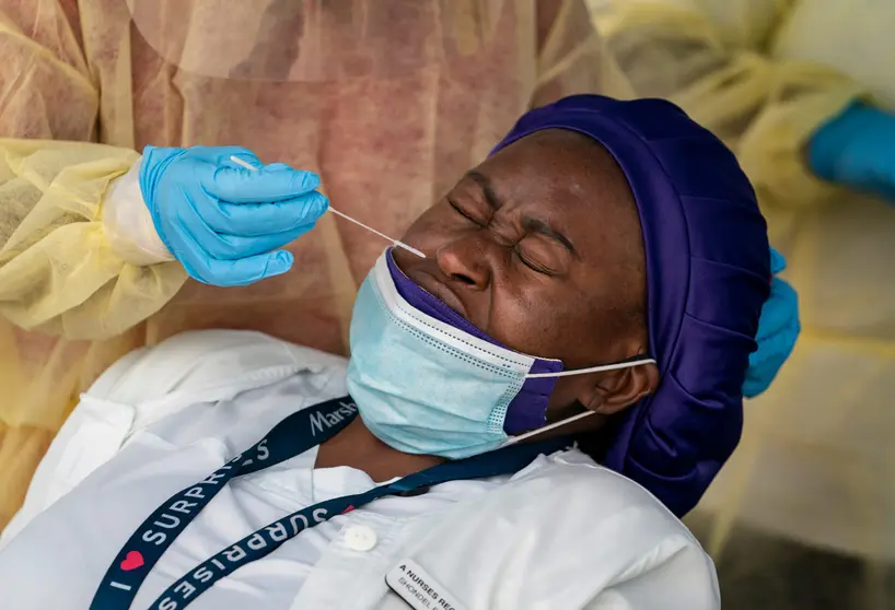 A certified nursing assistant gets tested for Coronavirus (Covid-19) at a mobile testing site at the Greenacres Community Center. There is a worrying trend of sharply rising coronavirus caseloads across several areas of the US, as the national curve again moves upward, potentially upending progress on stemming the spread. Photo: Greg Lovett/Palm Beach Post via ZUMA Wire/dpa