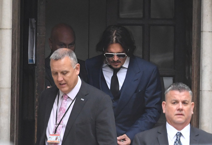 England, London: US actor Johnny Depp (C) leaves the High Court after giving evidence in his libel case against the publishers of The Sun and its executive editor Dan Wootton, because of an article which claimed that he physically abused his ex-wife. Photo: Kirsty O&#39;connor/PA Wire/dpa