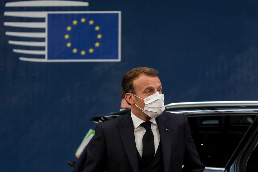 French President Emmanuel Macron wears a face mask as he arrives to attend the second day of the European Council special summit. Photo: European Council/dpa.