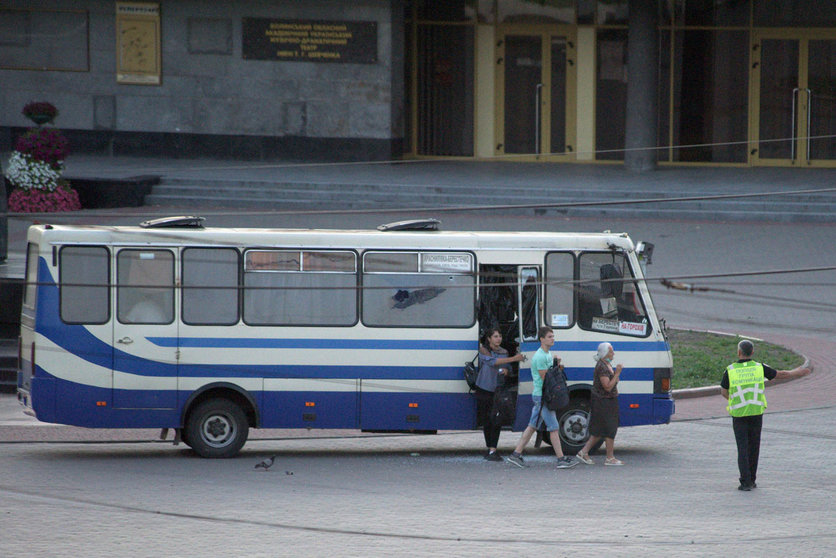 Ukraine, Lutsk: An elderly woman, a teenager and a pregnant woman leave the bus where a heavily armed man holds more than ten people hostage on a bus. All hostages aboard a bus were freed as authorities stormed the vehicle and captured the armed attacker. Photo: -/Ukrinform/dpa