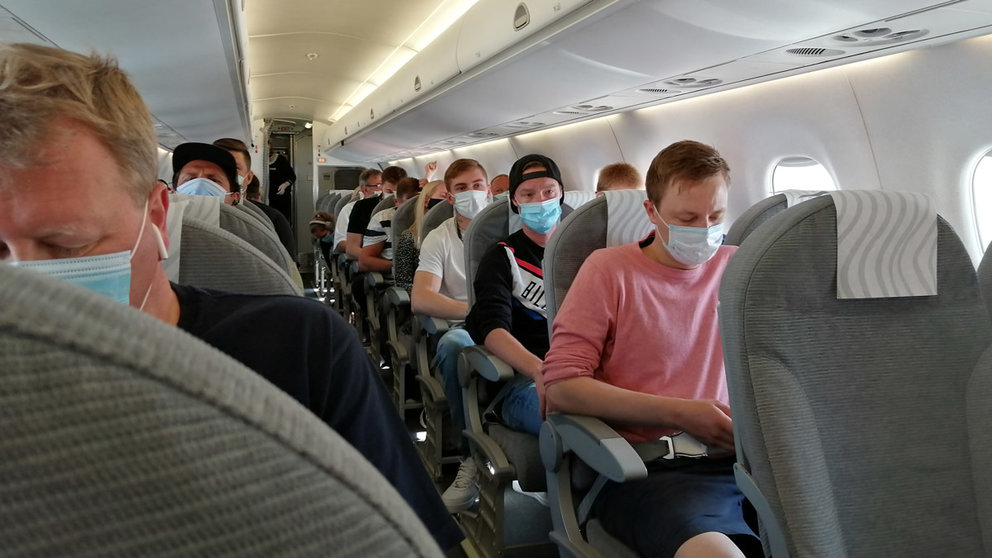 Passengers wearing face masks inside the aircraft during a Finnair flight. Photo: © The Nomad Today.