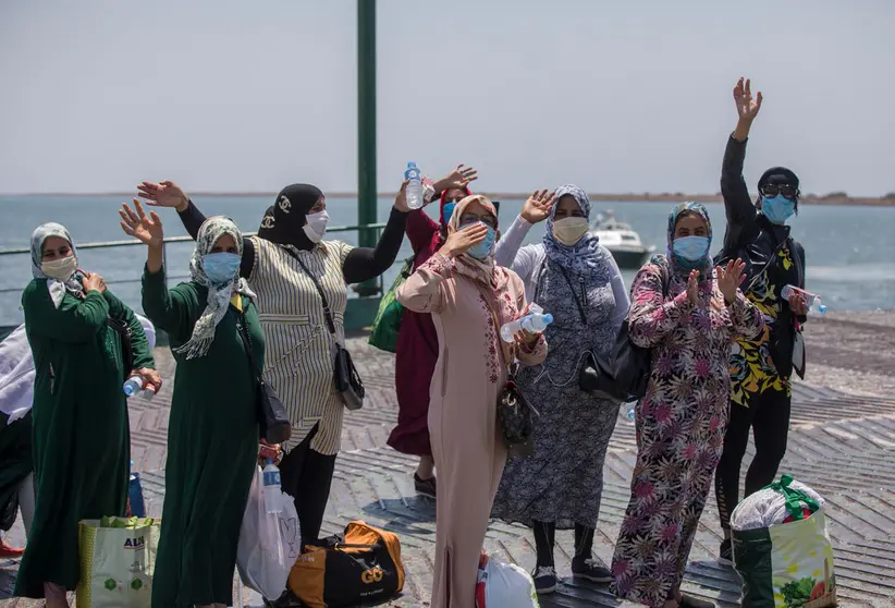 18 July 2020, Spain, Huelva: Moroccan seasonal workers embark a ferry from the south quay of the Port of Huelva on their way towards Morocco. Photo: María José López/dpa.