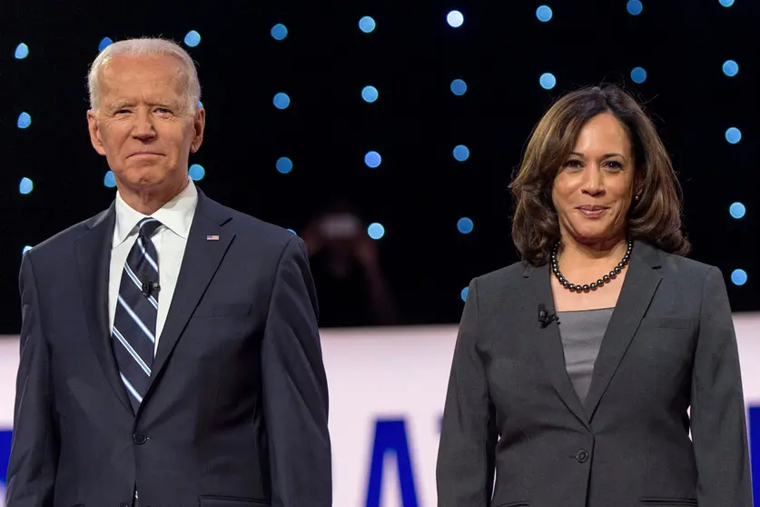 31 July 2019, US, Detroit: US Democratic presidential candidate and former Vice President Joe Biden (L) and California Senator Kamala Harris attend a Democratic debate. Biden, the presumptive Democratic presidential nominee, has selected California Senator Kamala Harris as his running mate for the US presidential election in November. Photo: Brian Cahn/dpa.