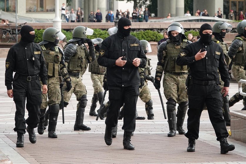 27 August 2020, Belarus, Minsk: Members of the AMAP (OMON) special police forces take position during a protest at the Independence Square against Belarusian President Alexander Lukashenko. Photo: Ulf Mauder/dpa.
