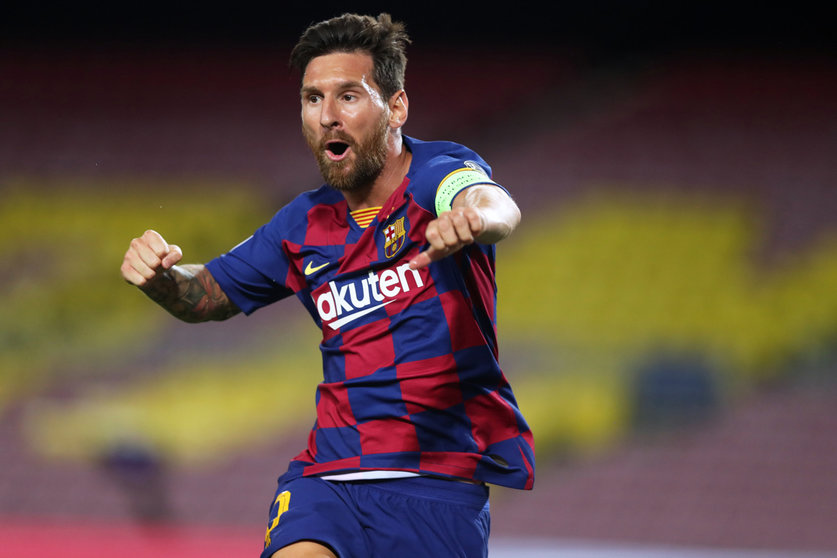 FILED - 08 August 2020, Spain, Barcelona: Barcelona&#39;s Lionel Messi celebrates scoring during the UEFA Champions League round of 16 second leg soccer match between Barcelona and Napoli at the Camp Nou Stadium. Lionel Messi confirmed he is staying at Barcelona until the end of the 2020-21 season. Photo: Miguel Ruiz/UEFA/dpa - ATTENTION: editorial use only in connection with the latest coverage about the transmission. The image may not be modified and can only be used in its entirety, i.e. may not be cropped. May not be archived. Only for use if the credit mentioned above is referenced in full.