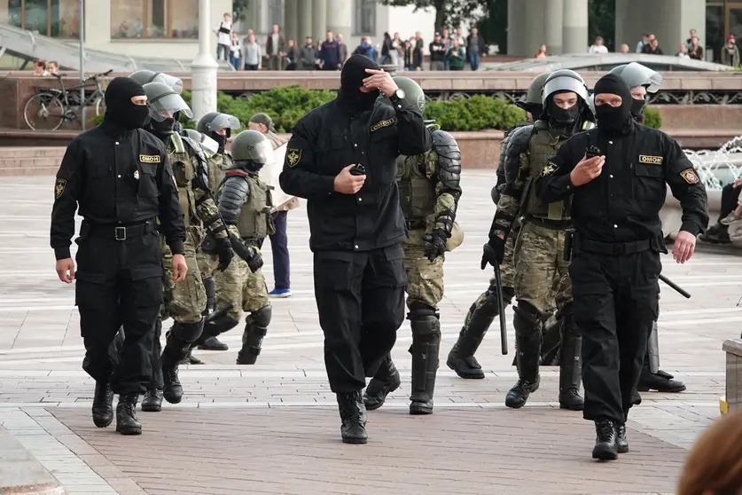 27 August 2020, Belarus, Minsk: Members of the AMAP (OMON) special police forces take position during a protest at the Independence Square against Belarusian President Alexander Lukashenko. Photo: Ulf Mauder/dpa.