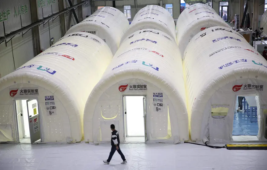 14 October 2020, China, Qingdao: A man walks in the Huo Yan laboratory after it comes into service as nine people were found infected with coronavirus (COVID-19). Photo: TPG/dpa.