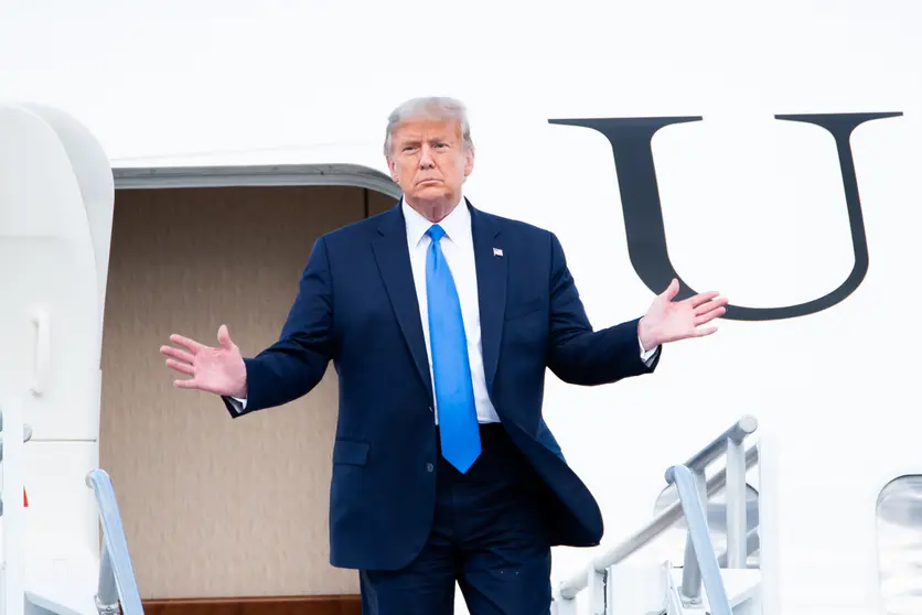 15 October 2020, US, Miami: US President Donald Trump disembarks from Air Force One upon his arrival at Miami International Airport on the way to campaign events. Photo: Orit Ben-Ezzer/dpa.