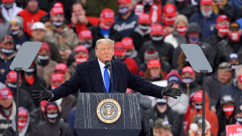 27 October 2020, US, Lansing: US President Trump speaks to supporters during a Make America Great Again campaign rally at the Lansing Regional Airport. Photo: Todd Mcinturf/dpa.