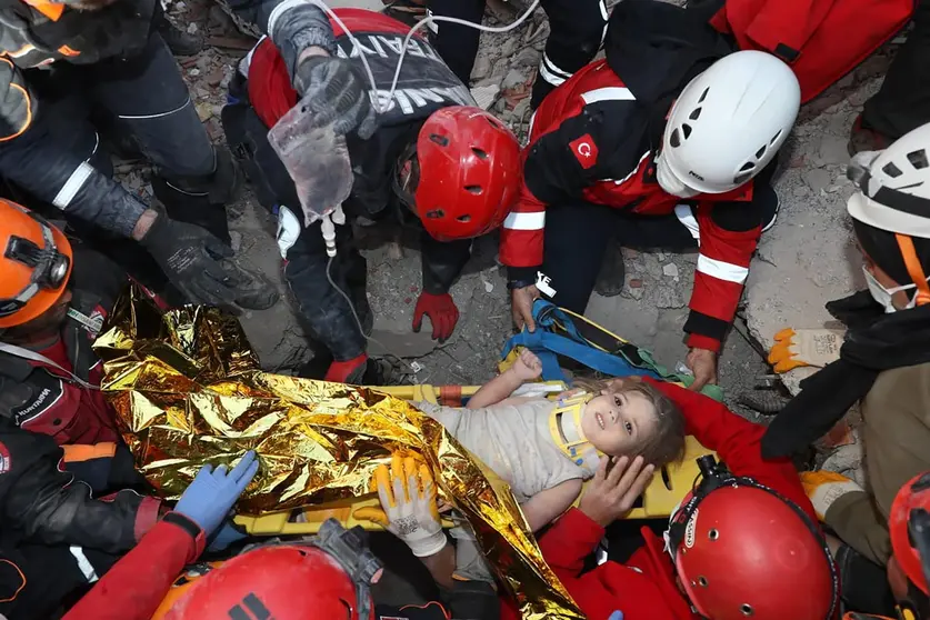 HANDOUT - 03 November 2020, Turkey, Izmir: A handout image provided by the Turkish Search and Rescue agency AFAD shows Ayda Gezgin being pulled out rubble of a collapsed building 91 hours after an earthquake rocking Izmir. Photo: -/AFAD/dpa