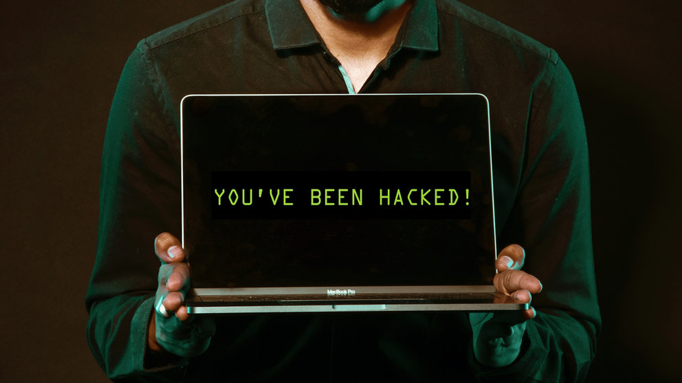Hacker-hacking-data-breach-by-pexels