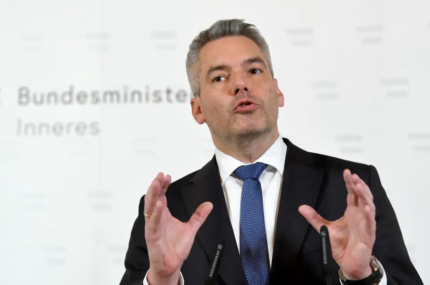 09 November 2020, Austria, Vienna: Austrian Interior Minister Karl Nehammer speaks during a press conference with the title &#34;Today&#39;s police measures&#34;. Austrian police raided more than 60 premises linked to the Islamist Muslim Brotherhood and the Palestinian Hamas movement as part of a terrorist investigation. Photo: Roland Schlager/APA/dpa.