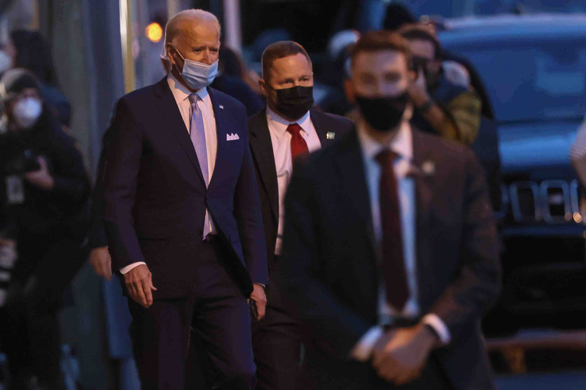 24 November 2020, US, Wilmington: US President-elect Joe Biden (L) leaves the Queen theatre after introducing his nominees and appointees to key national security and foreign policy. Photo: Saquan Stimpson/ZUMA Wire/dpa