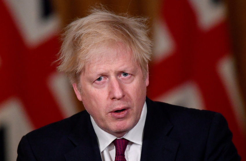 19 December 2020, England, London: UK Prime Minister Boris Johnson speaks during a press conference in response to the ongoing situation with the coronavirus (Covid-19) pandemic at 10 Downing Street. Photo: Toby Melville/PA Wire/dpa