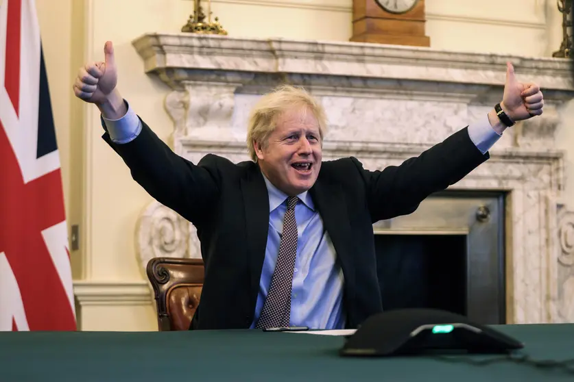 HANDOUT - 24 December 2020, England, London: British Prime Minister Boris Johnson gives a thumbs up during a video conference meeting with President of European Commission Ursula von der Leyen. Britain and the European Union have struck a historic post-Brexit trade deal just days before London was set to free-fall out of the bloc's tariff-free single market on January 1. Photo: Pippa Fowles/10 Downing Street/dpa - ATTENTION: editorial use only and only if the credit mentioned above is referenced in full