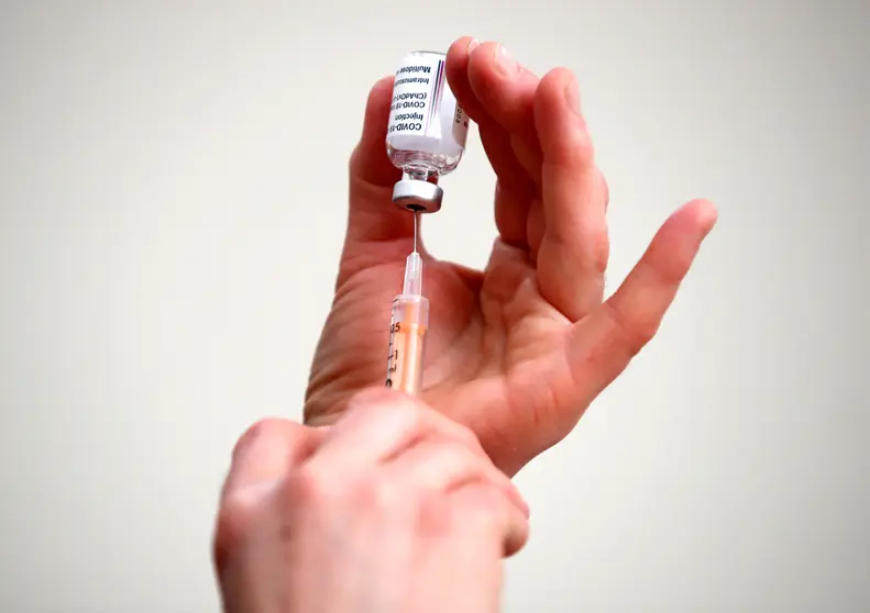 13 January 2021, England, Wenlock: An NHS staff member prepares a shot of the Oxford/AstraZeneca COVID-19 vaccine at the Lady Forester Community nursing home. Photo: Nick Potts/PA Wire/dpa