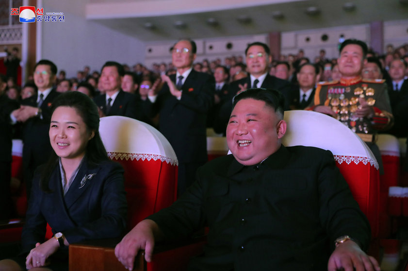 16 February 2021, North Korea, Pyongyang: A photo released by the Korean Central News Agency shows North Korean Leader Kim Jong-un (R) and his wife Ri Sol Ju watching a performance at the Mansudae Art Theater to mark the birthday of Kim's father, Kim Jong Il, who died in 2011, state media reported Wednesday. Kim's wife, Ri Sol Ju, has appeared in public for the first time in more than a year. Photo: -/YNA/dpa