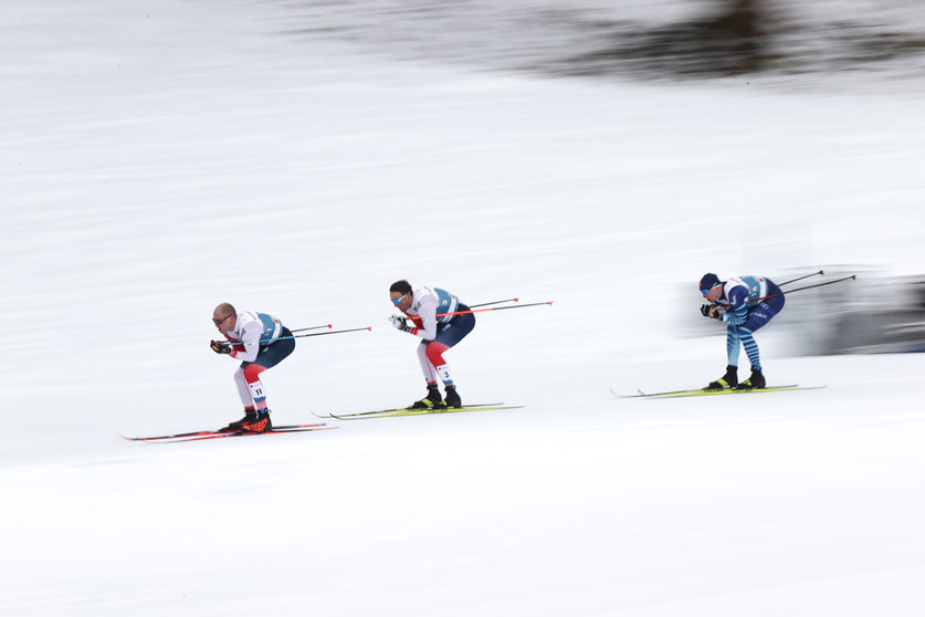 07 March 2021, Bavaria, Oberstdorf: (L-R) Norway's Paal Golberg, Norway's Emil Iversen and Finland's Iivo Niskanen in action during the men's 50 kilometre classical mass start event at the FIS Nordic World Ski Championships in Oberstdorf. Photo: Daniel Karmann/dpa