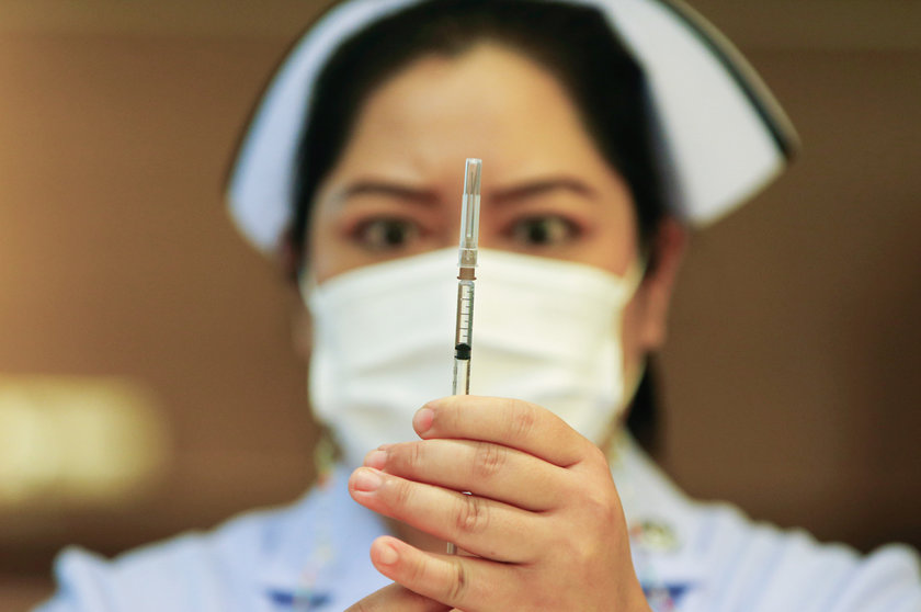 12 March 2021, Thailand, Bangkok: A health worker prepares a dose of AstraZeneca's COVID-19 vaccine at the Bamrasnaradura Infectious Diseases Institute in Nonthaburi province on the outskirts of Bangkok. Photo: Chaiwat Subprasom/SOPA Images via ZUMA Wire/dpa