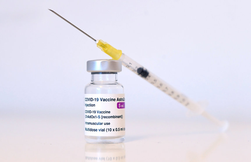 18 March 2021, Austria, Vienna: A vial of AstraZeneca's coronavirus vaccine can be seen at a vaccination centre. The European Medicines Agency deems the use of AstraZeneca's Covid-19 vaccine safe despite blood clot reports. Photo: Helmut Fohringer/APA/dpa