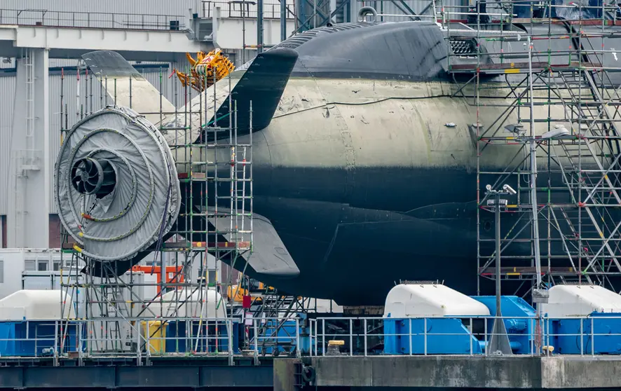 24 March 2021, Schleswig-Holstein, Kiel: A submarine under construction stands in the shipyard of ThyssenKrupp Marine Systems. Photo: Axel Heimken/dpa