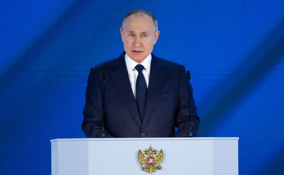 HANDOUT - 21 April 2021, Russia, Moscow: Russian Presidtnt Vladimir Putin delivers his annual State of the Nation address at the Moscow Manege. Photo: -/Kremlin /dpa - ATTENTION: editorial use only and only if the credit mentioned above is referenced in full
