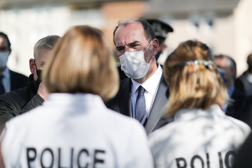 French Prime Minister Jean Castex speaking to police officers at the crime scene. Photo: Twitter/@JeanCASTEX