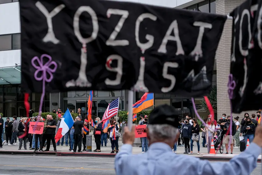 24 April 2021, US, Beverly Hills: Demonstrators wave flags during a rally by the Armenian community, held outside the Turkish Consulate in Los Angeles, to commemorate the 106th anniversary of the Armenian Genocide. US President Joe Biden has recognized the mass killings of Armenians by Ottoman Turks as "genocide," infuriating NATO ally Turkey in a move that is likely to further inflame Washington's tensions with Ankara. Photo: Ringo Chiu/ZUMA Wire/dpa