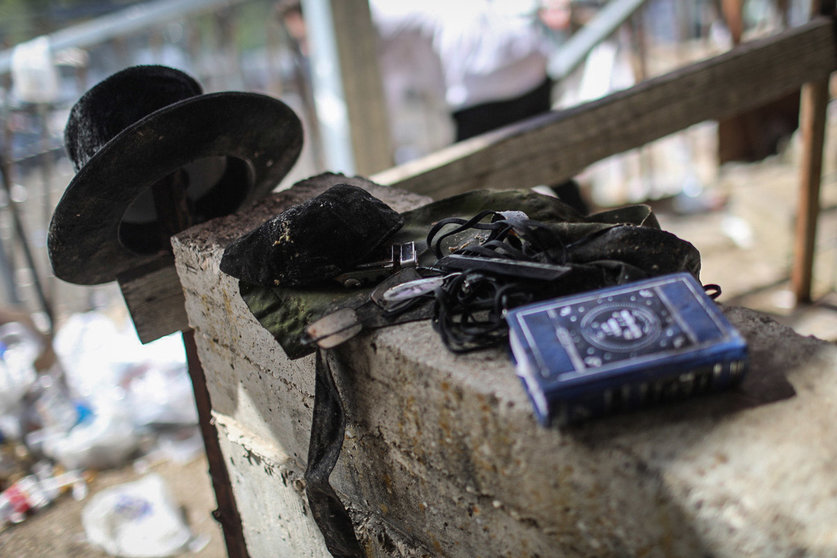 30 April 2021, Israel, Mount Meron: Leftover personal items are pictured at the Jewish Orthodox pilgrimage site of Mount Meron, where dozens of worshippers were killed in a stampede during the Jewish religious festival of Lag Ba'Omer in northern Israel early on Friday. Photo: Ilia Yefimovich/dpa
