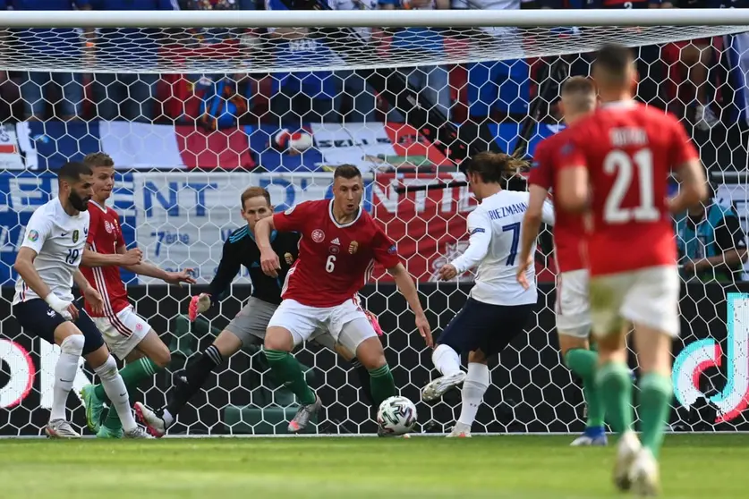 19 June 2021, Hungary, Budapest: France's Antoine Griezmann (R) scores his side's first goal during the UEFA EURO 2020 Group F soccer match between Hungary and France at the Puskas Arena. Photo: Robert Michael/dpa-Zentralbild/dpa