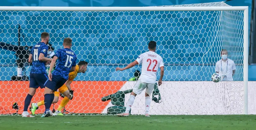 23 June 2021, Spain, Seville: Spain's Pablo Sarabia (R) scores his side's third goal during the UEFA EURO 2020 Group E soccer match between Slovakia and Spain at Estadio La Cartuja de Sevilla. Photo: Cezaro De Luca/dpa