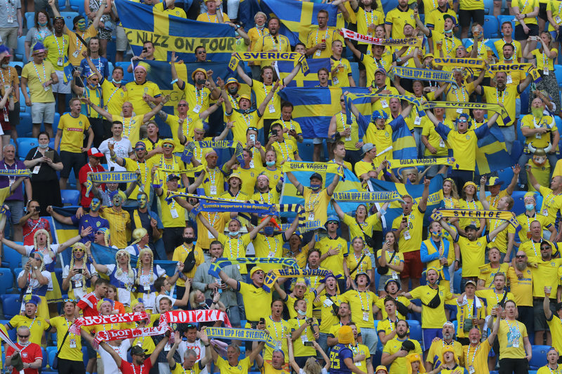Sweden fans cheer in the stands during the UEFA EURO 2020 Group E soccer match between Sweden and Poland at St. Petersburg Stadium on June 23. Photo: Igor Russak/dpa