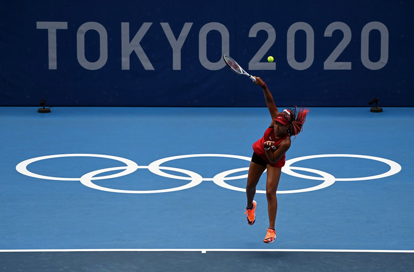 26 July 2021, Japan, Tokyo: Japanese tennis player Naomi Osaka in action against Swiss Viktorija Golubic during their Women's singles second round tennis match, as part of the Tokyo 2020 Olympic Games. Photo: Rob Walbers/BELGA/dpa