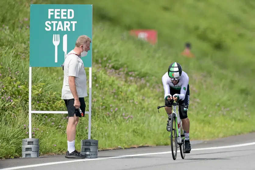 29 July 2021, Japan, Oyama: Patrick Moster, Sports Director of the BDR (German Cycling Federation), stands on the side of the track next to Azzedine Lagab from Algeria during the time trial. Moster will be sent home early from the Tokyo Games for making a racist remark during a time trial race, the national Olympic body (DOSB) has said Photo: Sebastian Gollnow/dpa