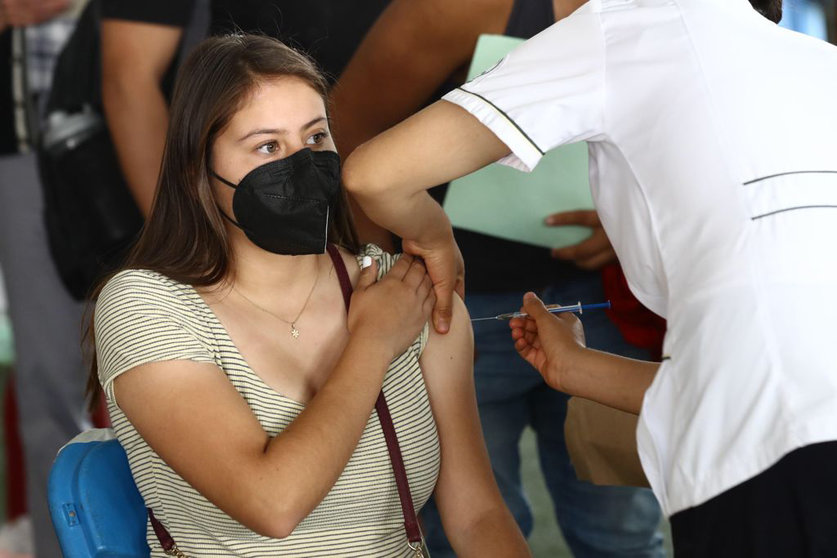 19 August 2021, Mexico, Mexico City: A girl receives her Coronavirus (Covid-19) vaccine at the vaccination center in the municipality of Xochimilco. Photo: -/El Universal via ZUMA Press Wire/dpa