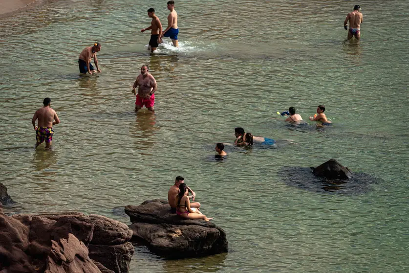 31 August 2021, Spain, Mercadal: Beachgoers enjoy the Mediterranean sea at the sunny Cavalleria beach at Menorca's north coast. Photo: Matthias Oesterle/ZUMA Press Wire/dpa