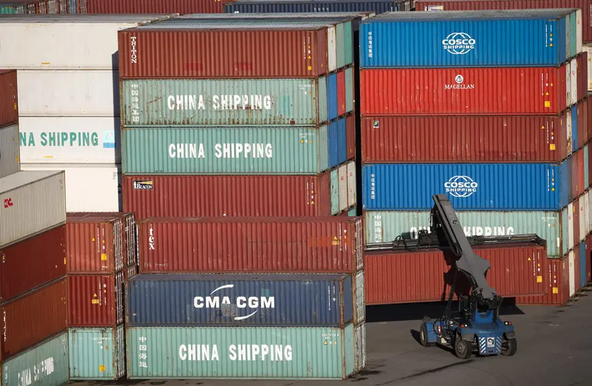 FILED - A container forklift is on the move at Hamburg Hafen und Logistik AG's (HHLA) Container Terminal Tollerort (CTT). Photo: Christian Charisius/dpa