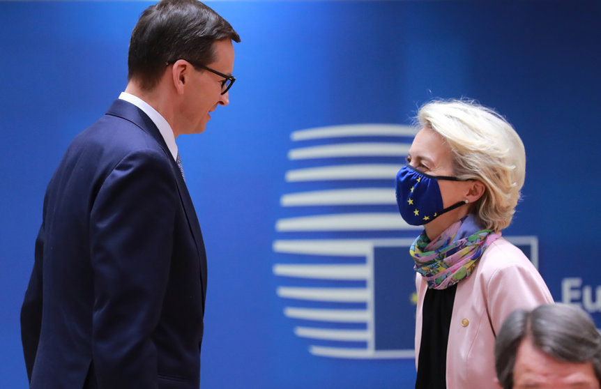 HANDOUT - Poland's Prime Minister Mateusz Morawiecki (L) speaks with European Commission President Ursula Von der Leyen during the European Union summit at The European Council. Photo: Zucchi Enzo/European Council/dpa - ATTENTION: editorial use only and only if the credit mentioned above is referenced in full