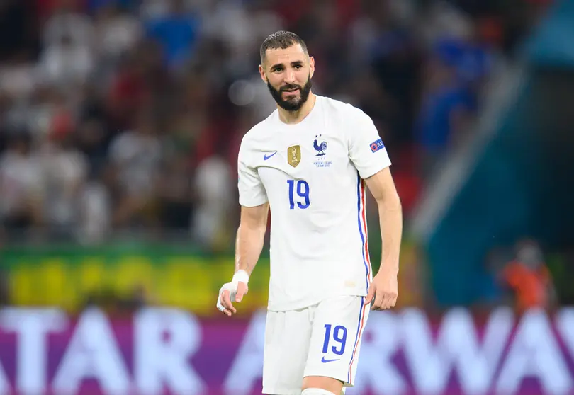 FILED - 23 June 2021, Hungary, Budapest: France's Karim Benzema in action during the UEFA European Football Championship soccer match between Portugal and France at Puskas Arena. Real Madrid and France striker Karim Benzema was on Wednesday handed a suspended one-year prison sentence over complicity to attempted blackmail in connection with a sex tape. Photo: Robert Michael/dpa-Zentralbild/dpa.