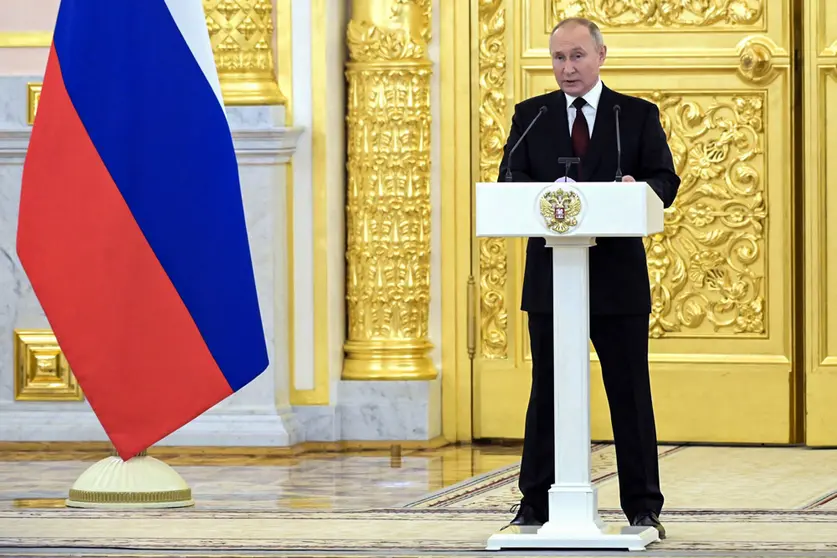 HANDOUT - 01 December 2021, Russia, Moscow: Russian President Vladimir Putin speaks during the reception of credentials from 20 newly appointed foreign ambassadors at the St Alexander Hall of the Grand Kremlin Palace. Photo: -/Kremlin/dpa - ATTENTION: editorial use only and only if the credit mentioned above is referenced in full.