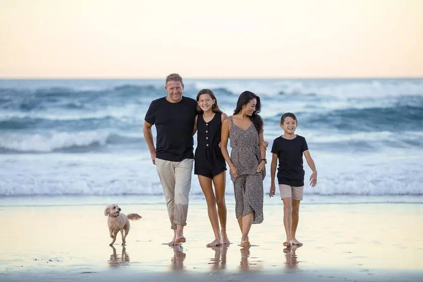 A family on the beach. Photo: Pixabay.