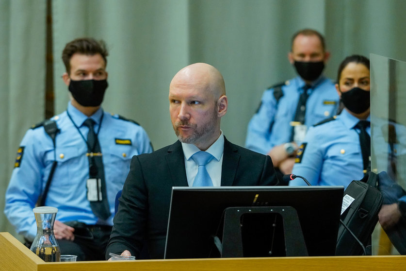 19 January 2022, Norway, Skien: Anders Behring Breivik (2nd L), convicted of terrorism after killing 77 people in July 2011, attends the second day of trial in the temporary courtroom at Skien Prison, where his application for early release is being heard by the Telemark District Court. Photo: Ole Berg-Rusten/NTB/dpa.