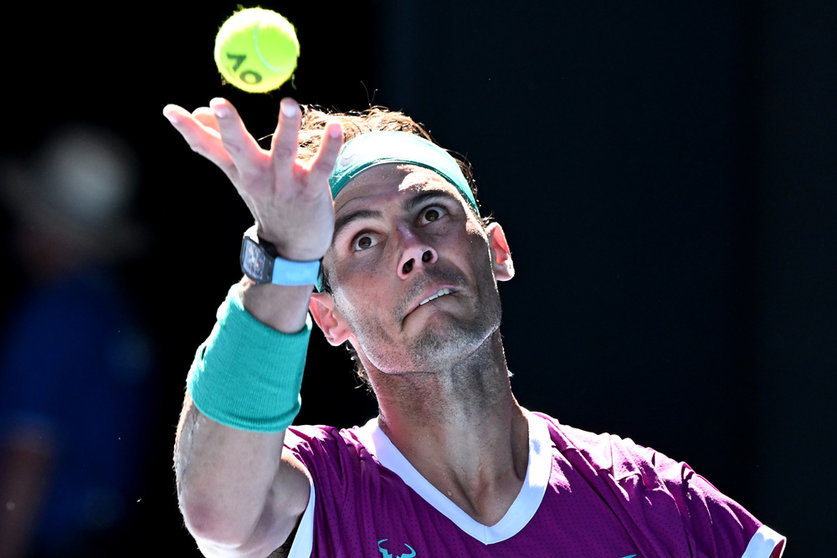 19 January 2022, Australia, Melbourne: Spanish tennis player Rafael Nadal serves against Germany's Yannick Hanfmann during their Second Round Men’s Singles tennis match on Day 3 of the 2022 Australian Open at Melbourne Park. Photo: Dave Hunt/AAP/dpa.