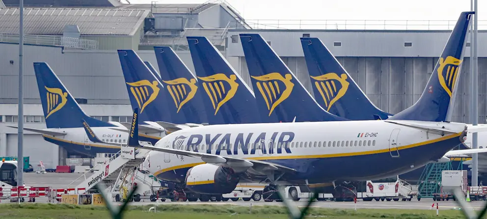 FILED - 05 April 2020, Ireland, Dublin: Ryanair jets park up on the runway of Dublin airport as flights are down by 83% due to Coronavirus. Ryanair, Europe's largest low-cost airline, said that traffic for the month of December surged to 9.5 million passengers from last year's 1.9 million. Photo: Niall Carson/PA Wire/dpa.