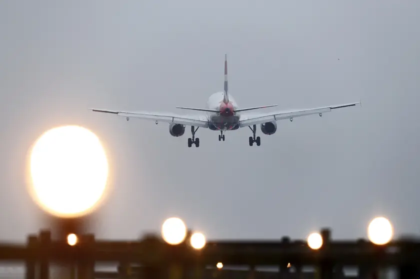 FILED - 19 December 2016, United Kingdom, Crawley: A plane lands at Gatwick Airport who has announced it will reopen its south terminal next month, to meet expected strong demand for air travel this summer. Photo: Gareth Fuller/PA Wire/dpa.