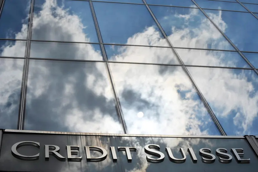 FILED - 14 July 2010, Hessen, Frankfurt_Main: A general view of the Credit Suisse bank logo placed onto the main entrance of the bank's branch in Frankfurt. Credit Suisse Group expects to achieve parity in its pre-tax profit during the fourth quarter. Photo: picture alliance / dpa.