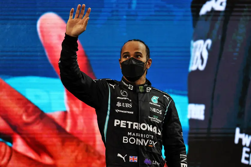 FILED - 12 December 2021, United Arab Emirates, Abu Dhabi: Second-placed British Formula One driver Lewis Hamilton of Team Mercedes looks dejected following the Abu Dhabi Formula One Grand Prix at the Yas Marina Circuit. Hamilton says he is ready to fight for titles in the coming season after working through the controversial loss of the drivers' championship in the final race of last year. Photo: -/PA Wire/dpa.