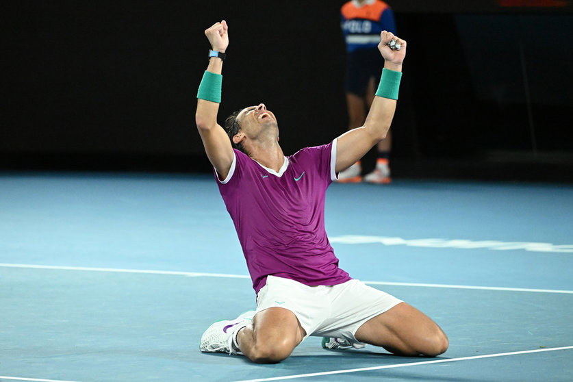 31 January 2022, Australia, Melbourne: Spanish tennis player Rafael Nadal celebrates defeating Russia's Daniil Medvedev to win their Men's Singles Final tennis match of the Australian Open. Photo: Dean Lewins/AAP/dpa